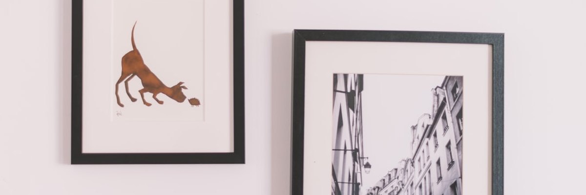 two assorted wall decors